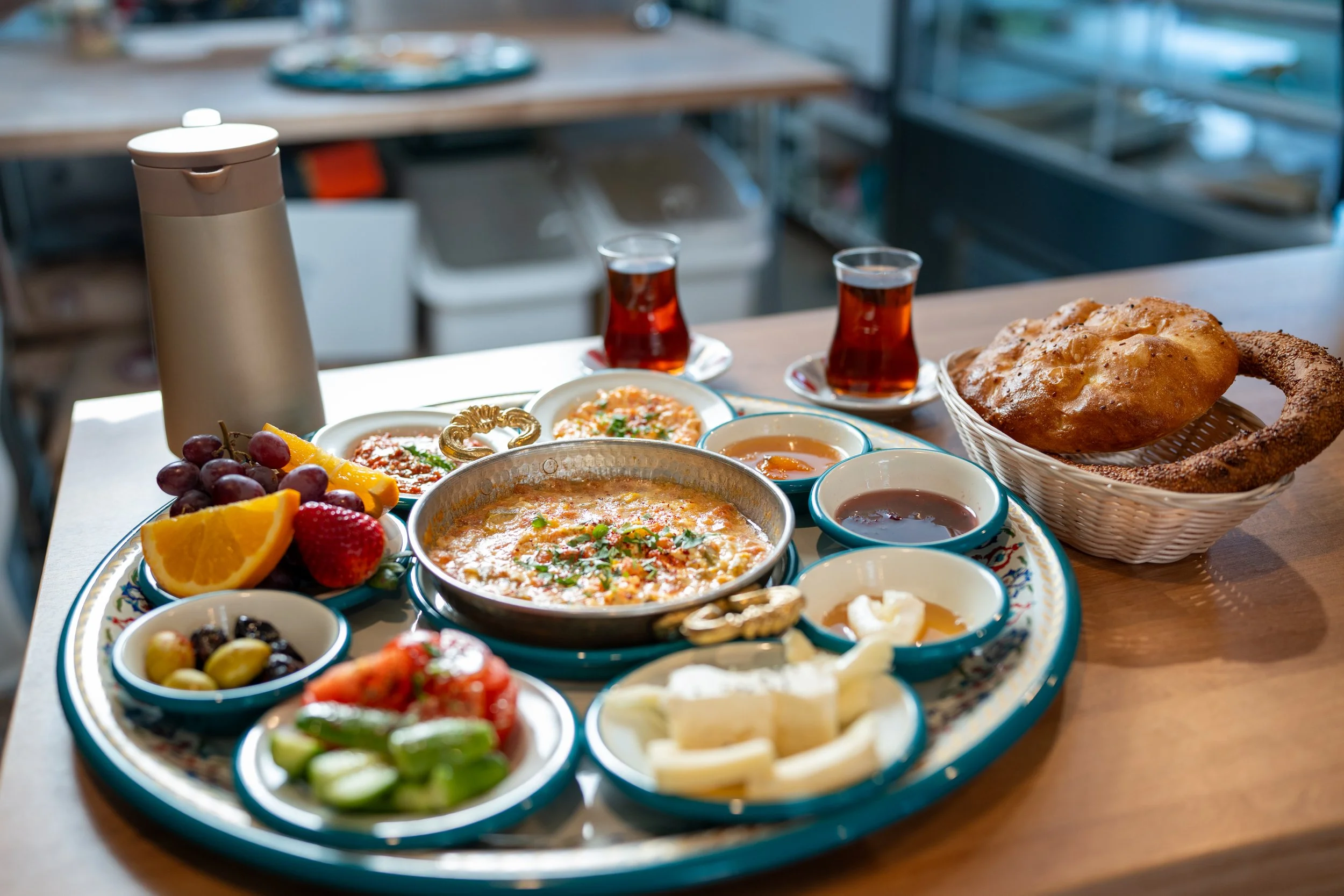 Traditional Turkish breakfast spread at Bernas Bakery and Restaurant in Issaquah with fresh bread tea and condiments